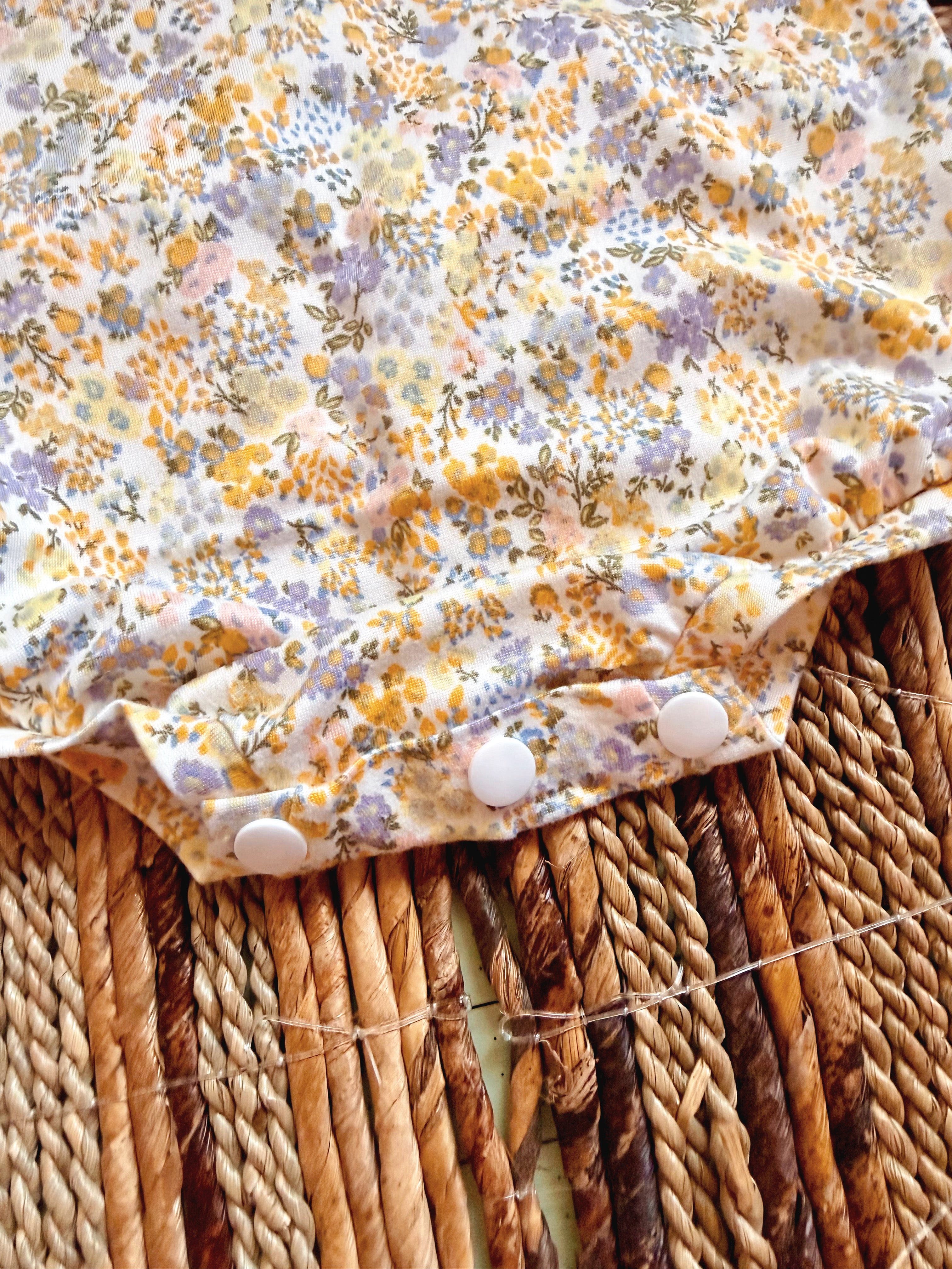 Purple/yellow floral Sofia romper